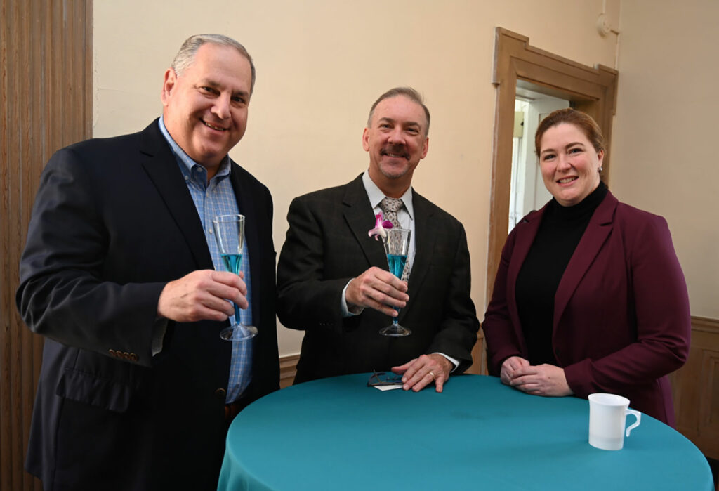 <em>left to right</em>: Steve Barber, Managing Director, Supporting Strategies, a 2023 Fall Brunch sponsor, and Richard Stone and Christina Tunison of the PrimeLife Companies, also Fall Brunch sponsors 
